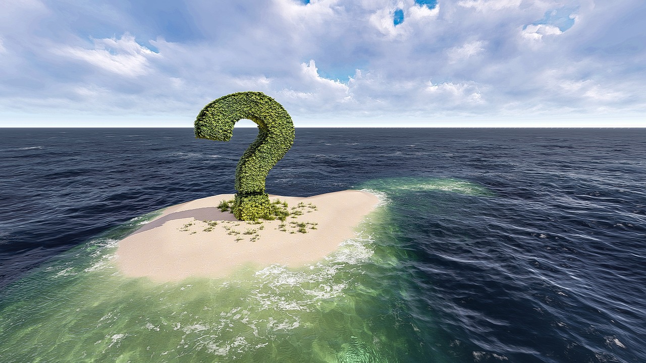 green question mark sign on a small island