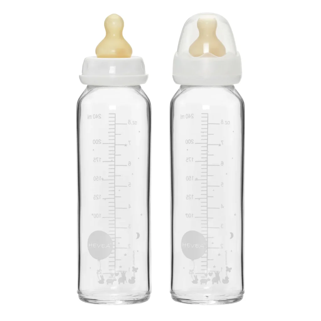 glass baby bottles next to each other