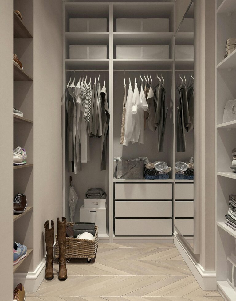 A thrifter's wardrobe. Walk in closet with clothes hanging, shoes organized on shelves, and other misc. items neatly placed in closet.