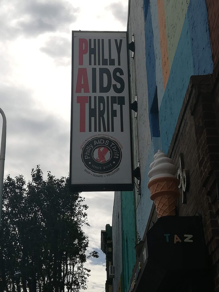 Store front photo with the signage of Philly AIDS Thrift.